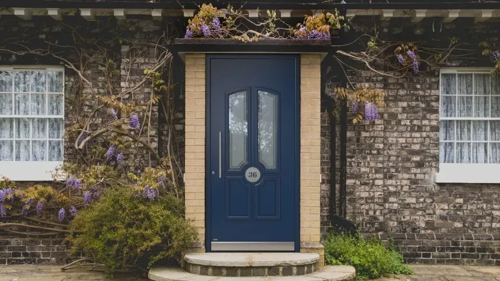 Blue front door with harmonious modern design