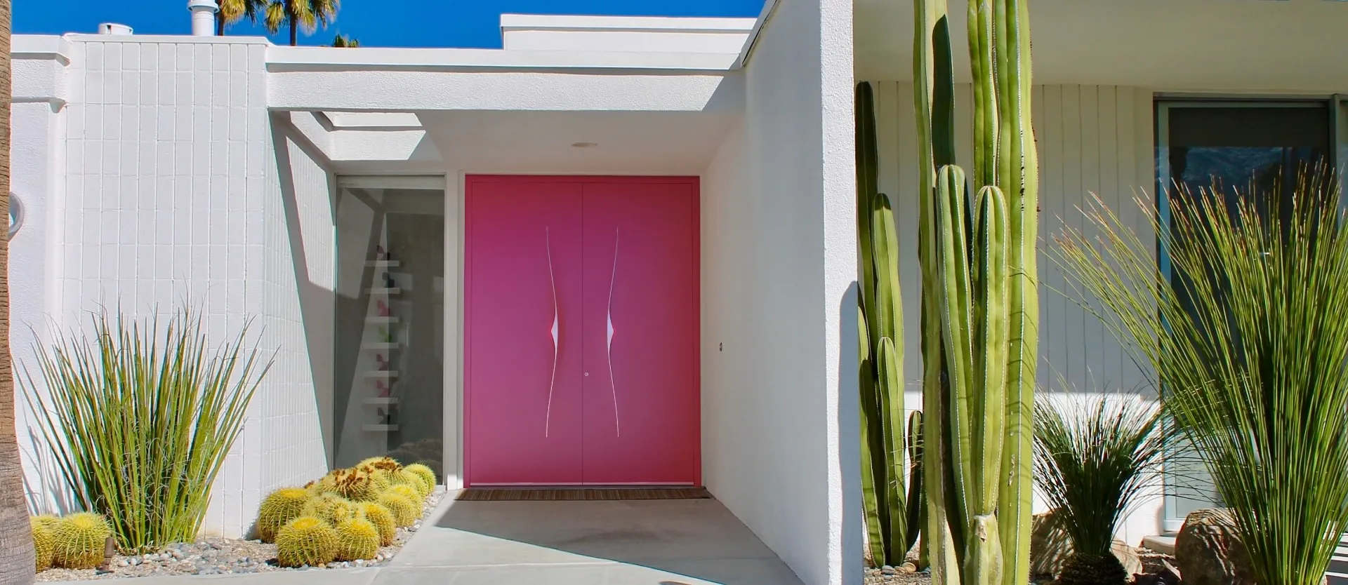 Pink front door with neutral exterior