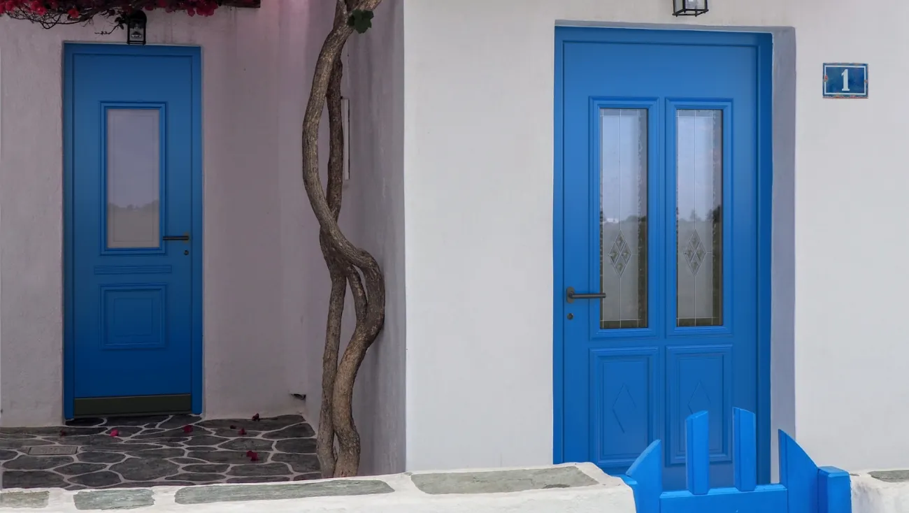 Blue pirnar doors with glass elements