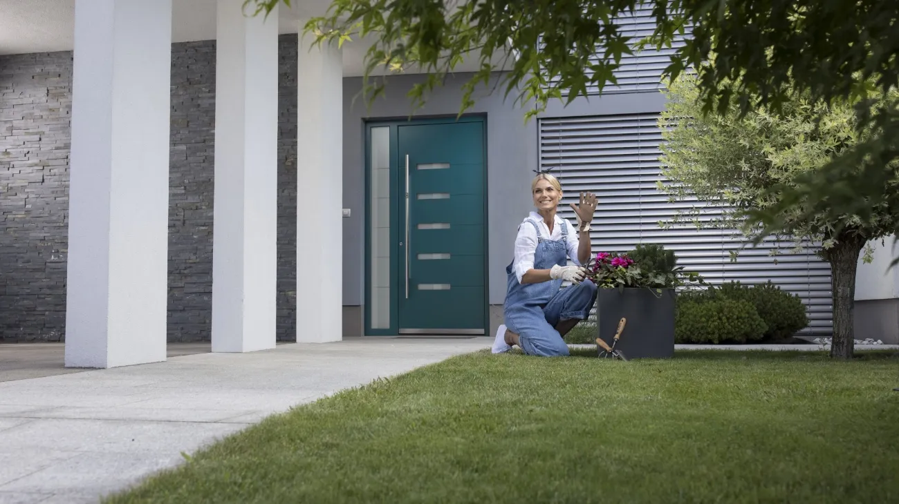 Teal front door on house exterior