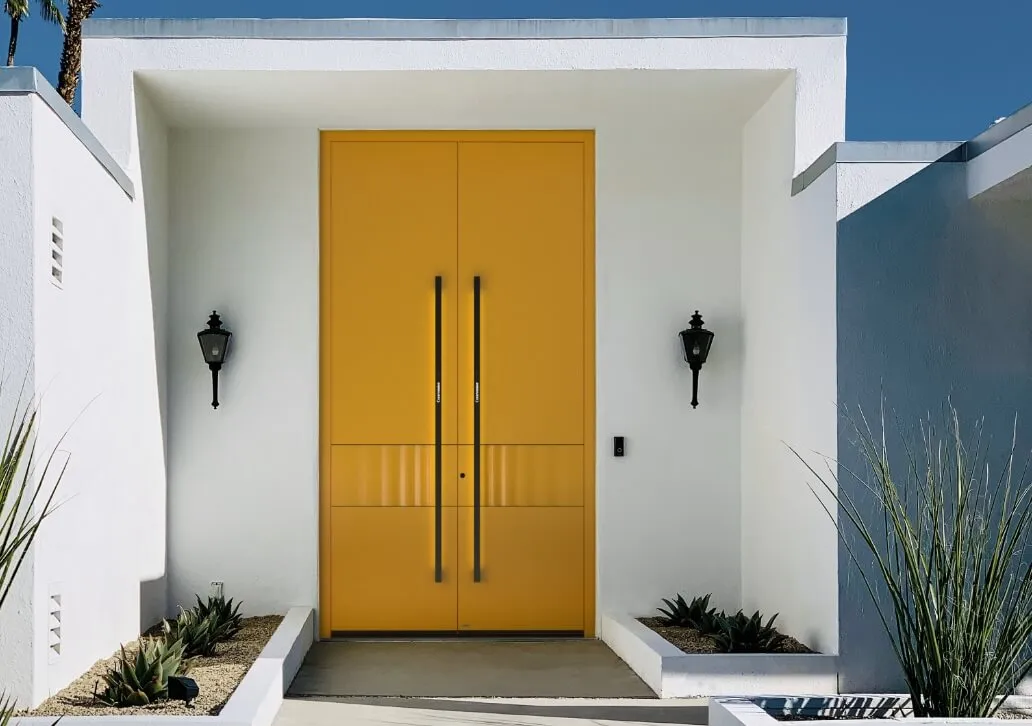 Yellow front door on house